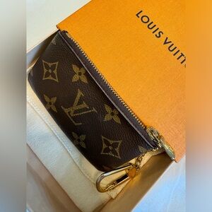 Louis Vuitton Key Pouch Monogram Brown. Used!